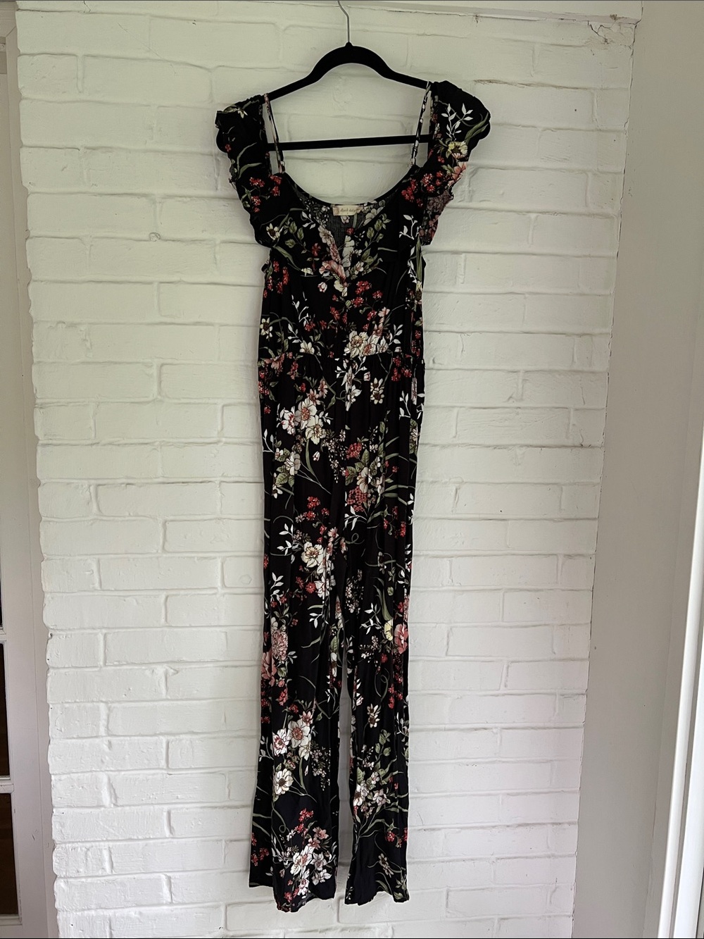 Altar'd State Black Floral Ruffled Off-Shoulder Flowy Jumpsuit